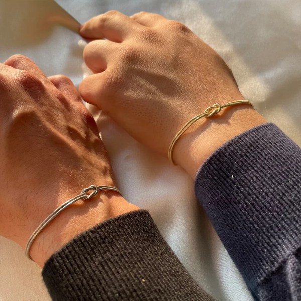 He7dbba0123f84ec88e19093b34530755s.webp Stainless Steel Gold Plated Couple Bracelet Classic Round Snake Chain Knotted Simple