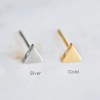 H9ce8a8d8b5bb4ee583434e5f4c7afd22t.webp Premium Classic 14K Gold Plated Stainless Steel Stud Earrings Women Glossy Triangle Simple Charm Jewelry
